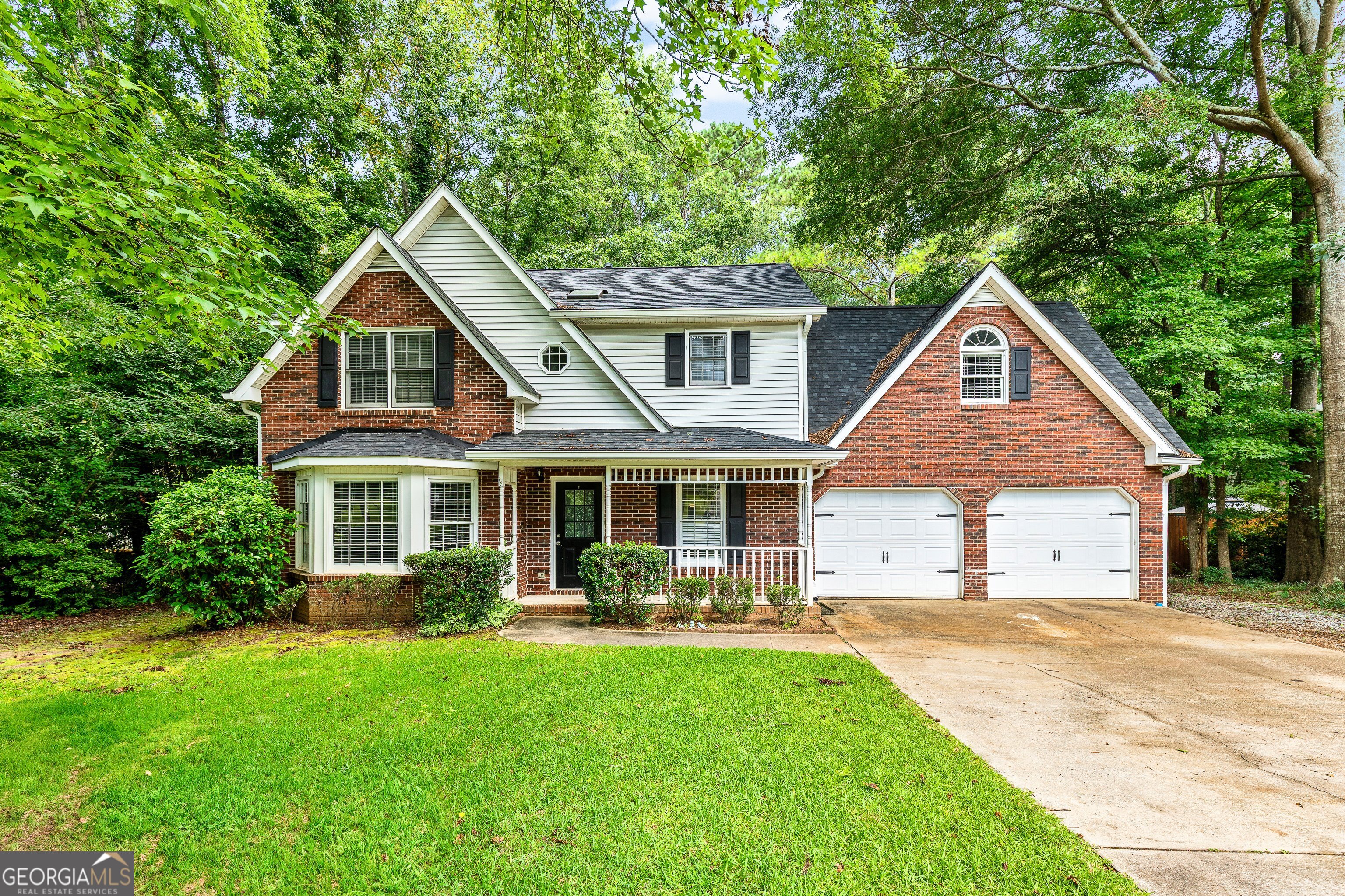Location, location, location! Nestled along Peachtree City's golf cart paths and located in the highly sought-after Starr's Mill school district, this 4-bedroom home offers a perfect blend of space, updates, and convenience-with no HOA. On the main floor, you'll find durable LVP flooring throughout, a spacious family room, a flex space perfect for a home office, gym, or playroom, an updated kitchen with granite countertops, and a deck overlooking the private backyard. Upstairs features the primary suite with a large, well-appointed bath, along with three additional bedrooms-all with upgraded carpet. Enjoy easy access to top-rated schools, popular dining spots, Lake McIntosh, and over 100 miles of golf cart paths-all just 25 minutes to Hartsfield-Jackson International Airport and minutes to Piedmont Fayette Hospital.