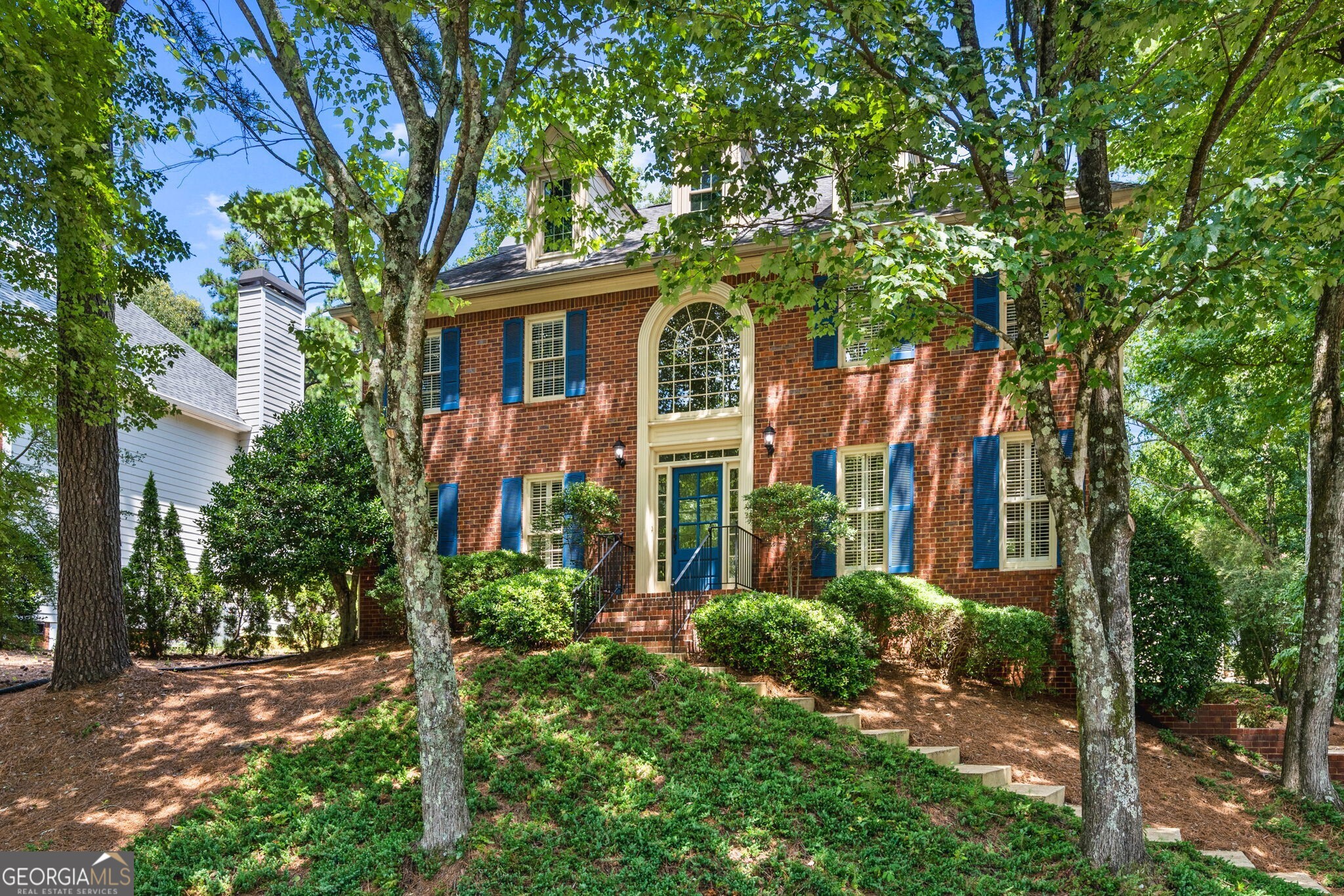 Welcome to Chatsworth! This sought after 4 bedroom 2.5 bathroom is situated on a premium corner lot within one of East Cobb's most desirable Swim/Tennis neighborhoods. Enter the home into your two-story foyer that opens to a large dining room on the right and flex space on the left. This formal living/playroom/office flex space has gorgeous French doors for an opening to the cozy family room and gas fireplace. Continuing this flow is straight to the screened in sunroom that boasts tons of natural light and vaulted ceilings. Making the way around the back of the home, your family room is open to your eat-in breakfast room and large kitchen with walk-in pantry and ample cabinet space that looks out into your manicured backyard. Finishing off your first floor is the half bathroom and walk in laundry room. Up the stairs, you have your primary suite on the left with his-and-hers closets, two separate vanities in the bathroom, soaking tub and separate shower. Separate from your Primary are three additional bedrooms and a full bathroom on the right side of the landing. Making your way down to the basement, you will find a large open space, and on the other half is a 3 door garage that fits 2 oversized vehicles and a separate golf cart entrance. The garage also boasts brand new premium Polyaspartic floors. Your backyard has been well maintained and offers privacy to your neighbors on the left and the back as well as a flat, grassy lawn and deck off your sunroom. This sought after neighborhood sits in the perfect slice of Roswell with Cobb County taxes. Close to Downtown Roswell, Hwy 92, shopping, restaurants and everything you would need! Brand New Carpet! Painted Kitchen Cabinets, New Hardware, Painted all Vanities!