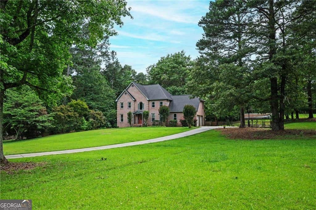 Photo of 13789 Woolsey Road, Hampton, GA 30228 (MLS # 10790910)