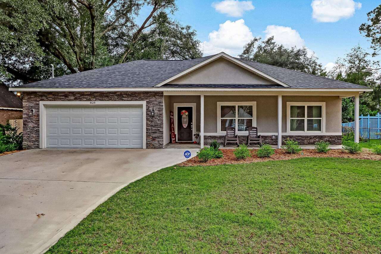 WELCOME HOME TO THIS GORGEOUS 2019 BEAUTY THAT IS BETTER THAN NEW! STEP INSIDE TO WOOD LOOK TILED FLOORS THAT LEAD TO THE OPEN FLOOR PLAN SHOWCASING A GORGEOUS KITCHEN WITH LARGE GRANITE COUNTERTOP HEIGHT BREAKFAST BAR, STAINLESS APPLIANCES, PANTRY MUD ROOM AND AMPLE CABINETRY. THE OPEN CONCEPT ALSO INCLUDES A DINING ROOM AND GREAT ROOM WITH SWEEPING VIEWS OF THE PRIVATE BACKYARD. MASTER SUITE INCLUDES A WALK IN CLOSET, A DOUBLE VANITY AND TILED WALK IN SHOWER. TWO OTHER SPACIOUS BEDROOMS SHARE A GUEST BATH. INTERIOR LAUNDRY ROOM, TWO CAR ATTACHED GARAGE, PRIVACY FENCED YARD, PATIO, STONE AND STUCCO EXTERIOR. CLOSE TO I95 AND EASY COMMUTE TO KING'S BAY, JACKSONVILLE OR BRUNSWICK. DID I MENTION IT WAS BUILT IN 2019? DON'T MISS YOUR CHANCE TO OWN A GORGEOUS NEW HOME WITHOUT WAITING TO BUILD! CALL TODAY FOR YOUR PRIVATE SHOWING.