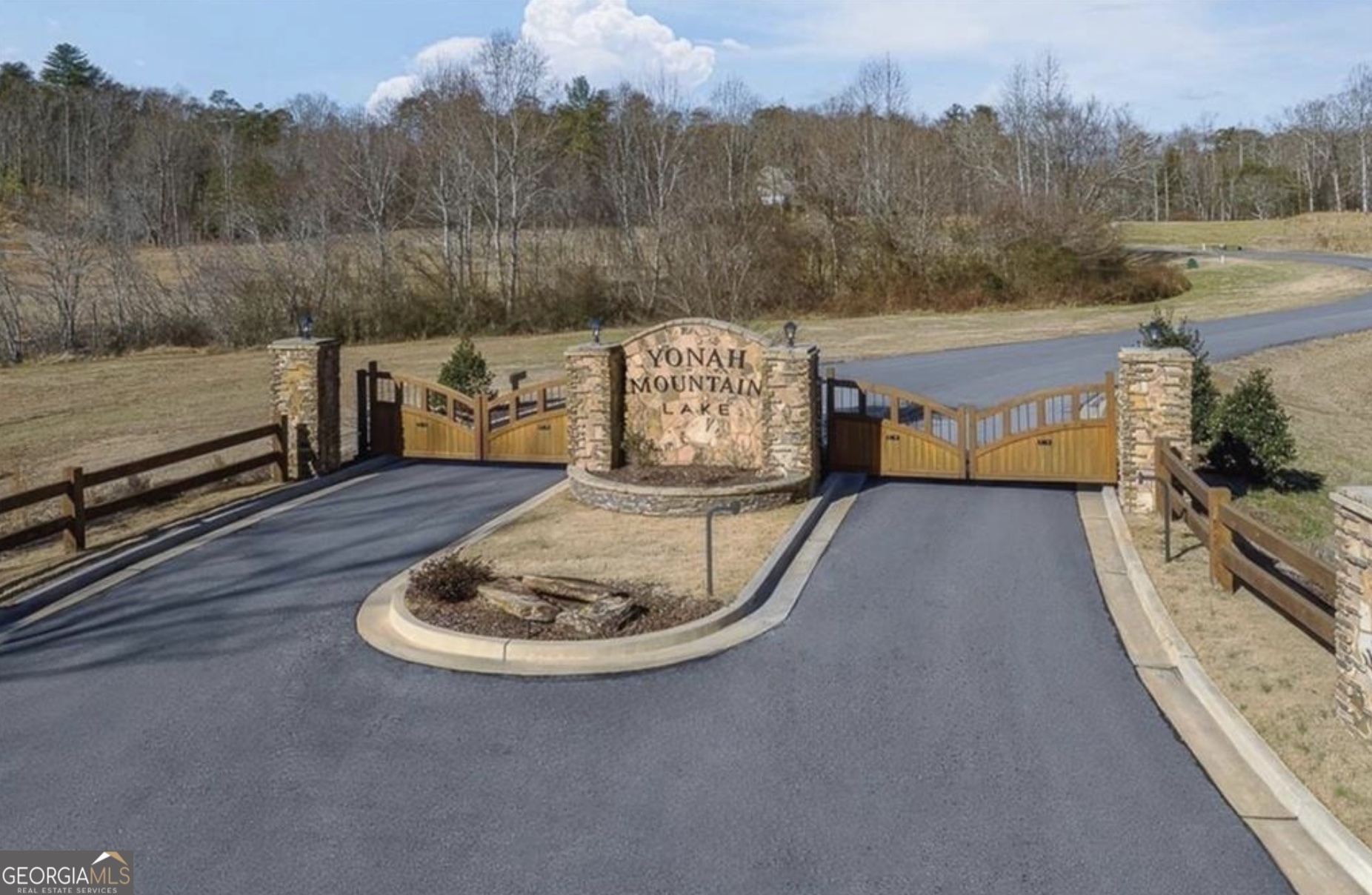 Residential Lot with Lake Views located in the Desired Gated Community of Yonah Mountain Lake. Neighborhood offers a Stocked Lake with Covered Grilling Area, Pier, Private Beach, HOA takes care of Dam Maintenance. Surrounded by Parks and Hiking Trails, with Direct Access to Chattahoochee National Forest. Easy Access to Community off of Major Roads and Convenient to Mountain Attractions.