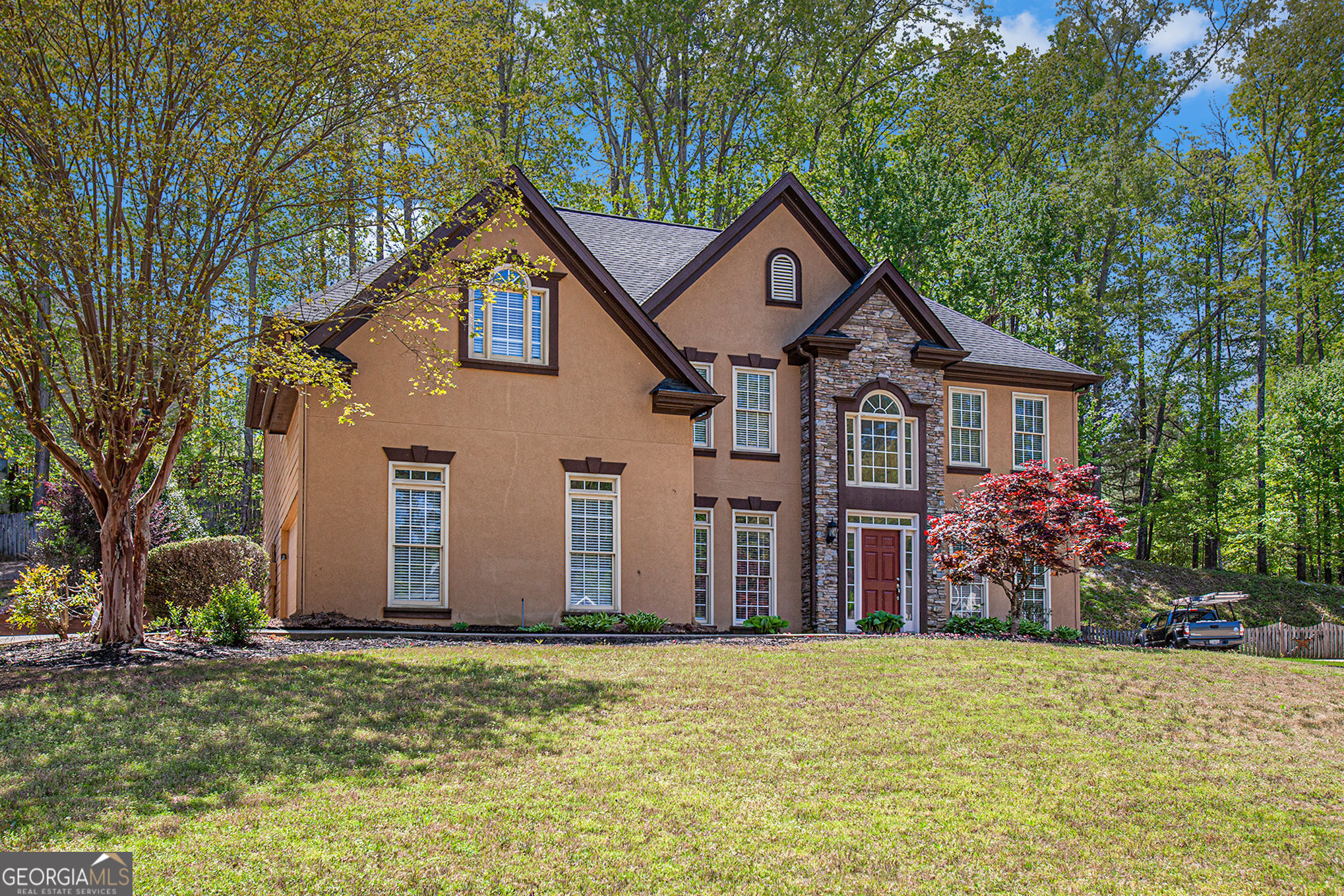 Tucked into a quiet cul-de-sac in sought-after West Cobb, this spacious home delivers the ideal blend of comfort, location, and lifestyle. As you step inside, the soaring two-story family room welcomes you with natural light pouring in from tall windows-setting the stage for lively gatherings or cozy nights in. The thoughtfully designed layout offers space for everyone, whether it's a quiet morning in the breakfast nook or entertaining friends in the open living areas. Located within an award-winning school system and just minutes from shopping, dining, parks, and all the conveniences of West Cobb, this home offers not just more square footage-but more life built in.