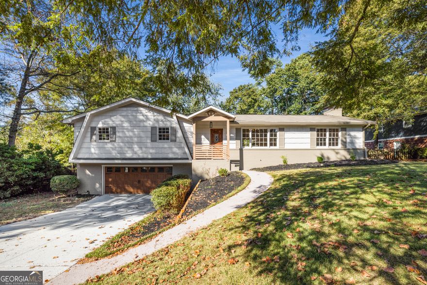 Welcome to 3465 Staci Court, a beautifully renovated mid-century ranch conveniently located in East Cobb's highly sought-after Lassiter High School district. This home offers the ideal blend of modern design, open living spaces, and timeless character, all set on a quiet cul-de-sac street. Step inside to discover a bright, open floor plan where the brand-new chef's kitchen features a large center island, stainless appliances, and sleek finishes that flow seamlessly into the dining area and the spacious family room. The show-stopping living space boasts soaring vaulted ceilings with exposed beams, fireplace and brick feature wall, creating the perfect setting for entertaining or relaxing by the fire. adjacent to the main living area is a versatile sunroom or home office. Enjoy outdoor living at its best on the expansive screened porch with vaulted ceilings or the new grilling deck overlooking the large, fenced backyard - ideal for gatherings, pets, and play. The main-level primary suite is a luxurious escape with an ensuite bathroom, complete with double vanities and a walk-in tiled shower. Two additional bedrooms and a beautifully updated full bath complete the main level. Downstairs, the finished basement level offers endless possibilities whether it be a recreation room, music/media lounge, or man cave, plus additional storage and access to the oversized two-car garage. This home truly has it all, style, space, and a prime East Cobb location close to parks, shopping, and top-rated schools.