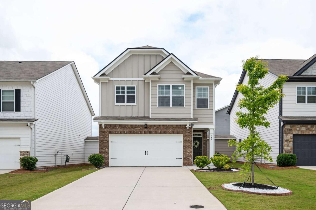 Nestled in an unincorporated part of Cherokee County and close to both I-75 and I-575, this Acworth home sits squarely between Downtown Acworth and Woodstock, and is convenient to shopping and award-winning schools. From the moment you walk through the door, you'll notice the daylight pouring in and the home's pristine, move-in ready condition. The excellent floor plan allows for easy entertaining with a nice flow and open concept on the main level. The updated kitchen boasts stained cabinets, granite counters, a lovely kitchen island, and pantry. The Sellers updated lighting on the main floor, as well! After a long day's work, curl up next to your gas log fireplace with a good book and a cup of coffee, or retreat upstairs to soak in your spa-like tub. The primary bedroom and bath boast tray ceilings with dual vanities and a separate tub and shower The three secondary bedrooms are spacious and neat. The private and level backyard has an expanded patio, a gazebo that will stay with the home, two storage closets, and a nice privacy fence! Think of all the cook-outs you'll have! The HOA maintains the lawn, so you'll have more free time for fun! This home has been pet and smoke free, and faces East.