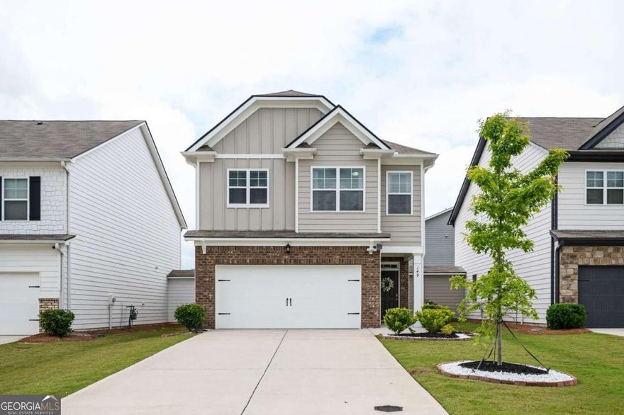 Nestled in an unincorporated part of Cherokee County and close to both I-75 and I-575, this Acworth home sits squarely between Downtown Acworth and Woodstock, and is convenient to shopping and award-winning schools. From the moment you walk through the door, you'll notice the daylight pouring in and the home's pristine, move-in ready condition. The excellent floor plan allows for easy entertaining with a nice flow and open concept on the main level. The updated kitchen boasts stained cabinets, granite counters, a lovely kitchen island, and pantry. The Sellers updated lighting on the main floor, as well! After a long day's work, curl up next to your gas log fireplace with a good book and a cup of coffee, or retreat upstairs to soak in your spa-like tub. The primary bedroom and bath boast tray ceilings with dual vanities and a separate tub and shower  The three secondary bedrooms are spacious and neat. The private and level backyard has an expanded patio, a gazebo that will stay with the home, two storage closets, and a nice privacy fence! Think of all the cook-outs you'll have! The HOA maintains the lawn, so you'll have more free time for fun!  This home has been pet and smoke free, and faces East.