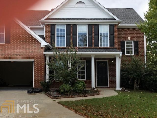 Location, Location, Location. Close to I-85 and Chateau Elan. All brick 4 bedroom 3 bath home. Great room is 2 stories with hardwood floors and fireplace. Dining room also has hardwood floors. Tile in eat in kitchen. Bedroom on main with full bath. Master bedroom has huge sitting area.