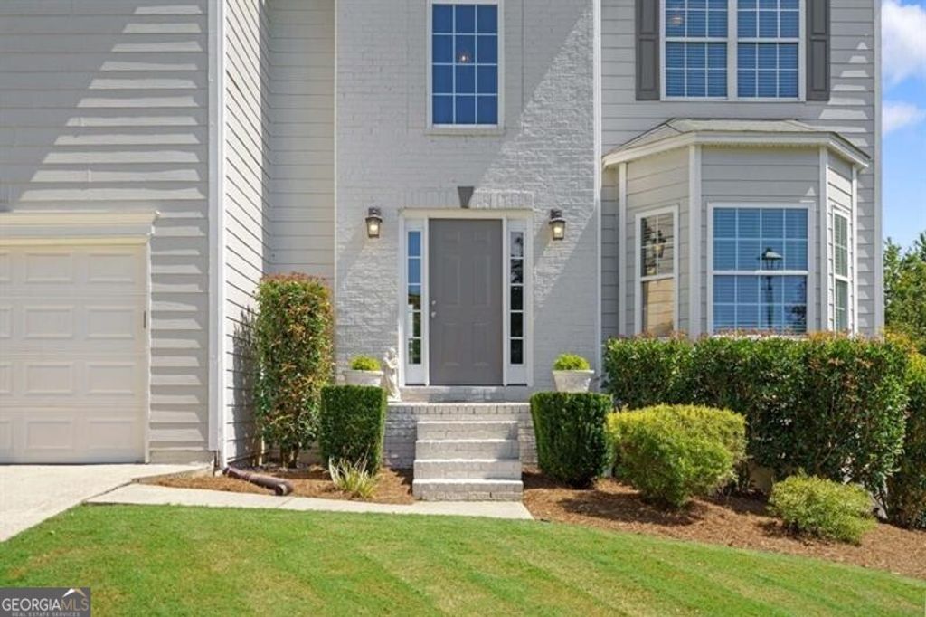 Photo of 640 Rockbass Road, Suwanee, GA 30024 (MLS # 10660856)