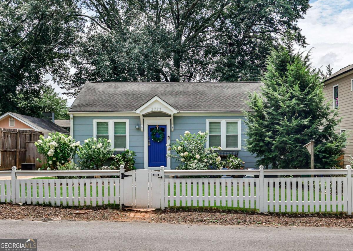 Oh my, you're going to want to rush on over to see this picture-perfect gem. This lovely 2 bedroom, 1.5 bath home just oozes charm everywhere you turn. From the white picket fence, to the welcoming living room as you enter, to the well laid out kitchen that flows into a magnificent vaulted great room, you're going to love every square inch. Meticulously maintained, the home has a 7-year-old roof, 5 year old tankless water heater, recently serviced HVAC system, extensive basement/humidity work, and a 3 year old washer/dryer, and dishwasher. Beautiful plantation shutters adorn each bedroom and the living room. And that's not all; the surprisingly large, fully fenced, manicured backyard boasts a beautiful walk-out deck and a two-car garage structure that is perfect for a home gym, projects, storage or parking! City of Decatur living without the taxes! So close to downtown Decatur, and walking distance to Avondale Estates, with access to great restaurants and stores. Right on the MARTA line and close to I-285 and I-20. Very easy to Emory, GSU, downtown, midtown, DeKalb Farmers Marker, Oakhurst, East Lake, Kirkwood and Museum, Waldorf & Friends Schools. So come visit us Sunday July 27 from 2:00-5:00 and get ready to be impressed.