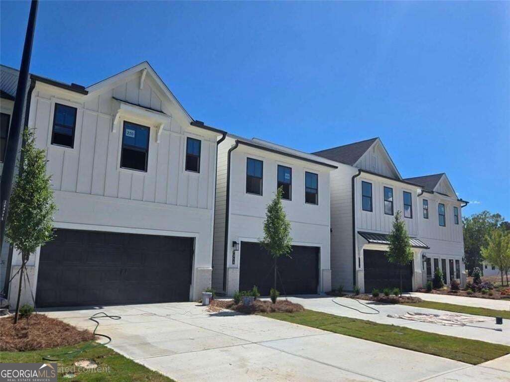 Photo of 7255 Sherwood Square Drive #110, Flowery Branch, GA 30542 (MLS # 10877334)
