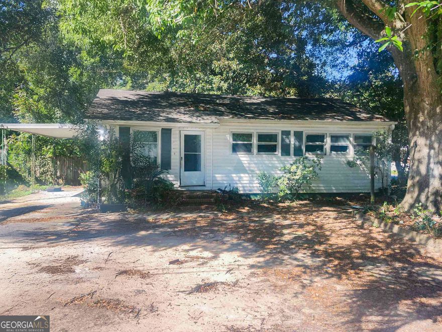Attention Investors! Don't miss this rare opportunity to transform a ranch-style home with solid potential in the heart of Warner Robins. Offering approximately 965 sq. ft. of living space, this property includes 3 bedrooms, 1 full bath, and a functional floor plan ready for your vision. Built in the 1950s, it showcases classic mid-century character and is primed for a full renovation to bring it back to life. Key features include a rear patio for outdoor enjoyment, a fenced yard that offers privacy and usability, and a convenient 1-car carport. While the home requires repairs and updates throughout, it provides the perfect blank canvas for a fix-and-flip project or long-term rental investment. The location is hard to beat-just minutes from Warner Robins High School, McConnell-Talbert Stadium, and Houston Healthcare/Emory Hospital, plus close to shopping, dining, parks, and everyday conveniences. With its central setting in a growing community, the property combines accessibility with long-term value. Opportunities like this don't stay on the market for long. Whether you're an experienced rehabber or just starting your investment portfolio, this is a chance to create significant value and unlock strong returns. Schedule your showing today and discover the possibilities waiting at 601 Paul Street! Being sold AS IS, WHERE IS, Buyer is responsible for all inspections and any city requirements to close. All information and property details set forth in this listing, including all utilities and all room dimensions which are approximate and deemed reliable but not guaranteed and should be independently verified if any person intends to engage in a transaction based upon it. Seller/current owner does not represent and/or guarantee that all property information and details have been provided in this MLS listing.