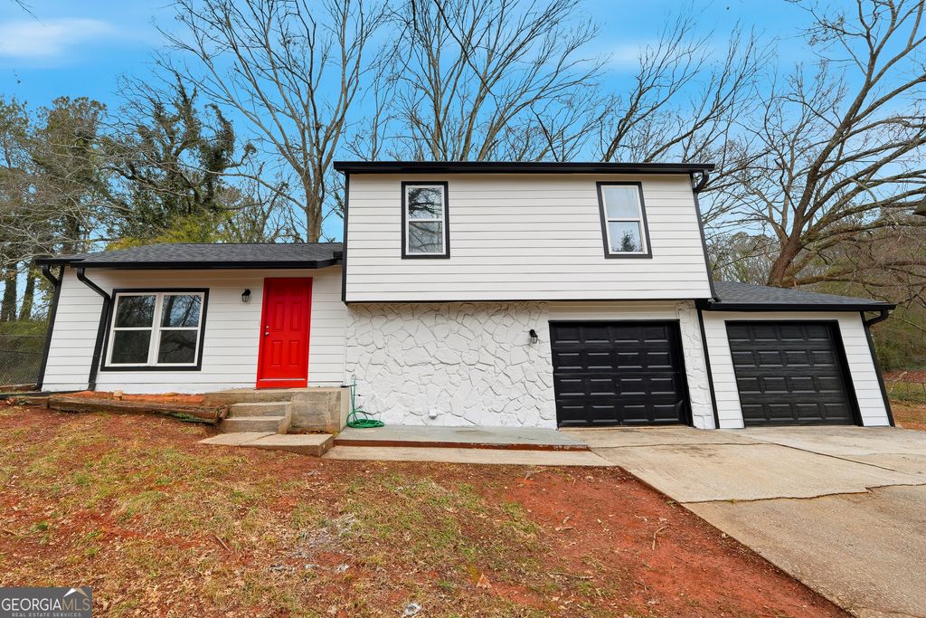 Photo of 677 Tarkington Road S, Stone Mountain, GA 30088 (MLS # 10679935)