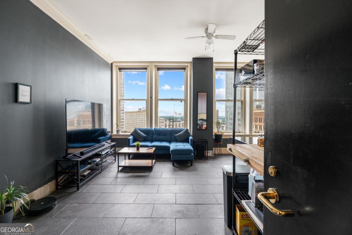 Historic Healey Building 14th Floor Unit 14H $155,000 STEPS TO GA STATE CAMPUS Located in the heart of downtown Atlanta, this 14th-floor condo sits in the iconic Healey Building - a registered historic landmark and one of the city's architectural treasures. Perfectly positioned between Centennial Olympic Park and Woodruff Park, you'll be surrounded by the very best of urban Atlanta. Just outside your door: - Georgia State University (this building sits on its campus) - Mercedes-Benz Stadium - home to the Falcons and Atlanta United - State Farm Arena, CNN Center, College Football Hall of Fame - Walk to MARTA, top dining, coffee shops, and retail - Steps from the Underground Atlanta redevelopment and everything emerging in South Downtown The unit is priced to sell at $155,000. It's move-in ready but could shine with a few cosmetic updates - perfect for buyers who want value and vision in one of Atlanta's most walkable, connected neighborhoods. Live in a piece of history while enjoying the pulse of the modern city. This is a future smart investment surrounded by current growth and development!