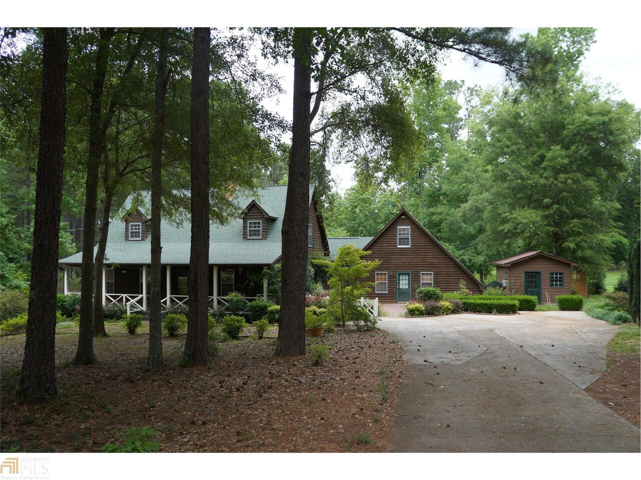 Enjoy quiet country living with plenty of space in this 4 bedroom 3 and half bath East Newton home. Home has many recent upgrades including roof, oversized vaulted family room addition with tongue and groove ceiling, enlarged back deck, HVAC, kitchen with granite tops and huge island. The living room features built in bookcases and a wood stove. Formal dining room, master on main, two bedrooms and one bath upstairs, enclosed breezeway leads to more finished space (could be used as an in-law suite) with living area, full bath and upstairs bedroom. Workshop with power and double doors, nice landscaping, additional outbuilding and a huge, private backyard. This home is an excellent value in a great location!