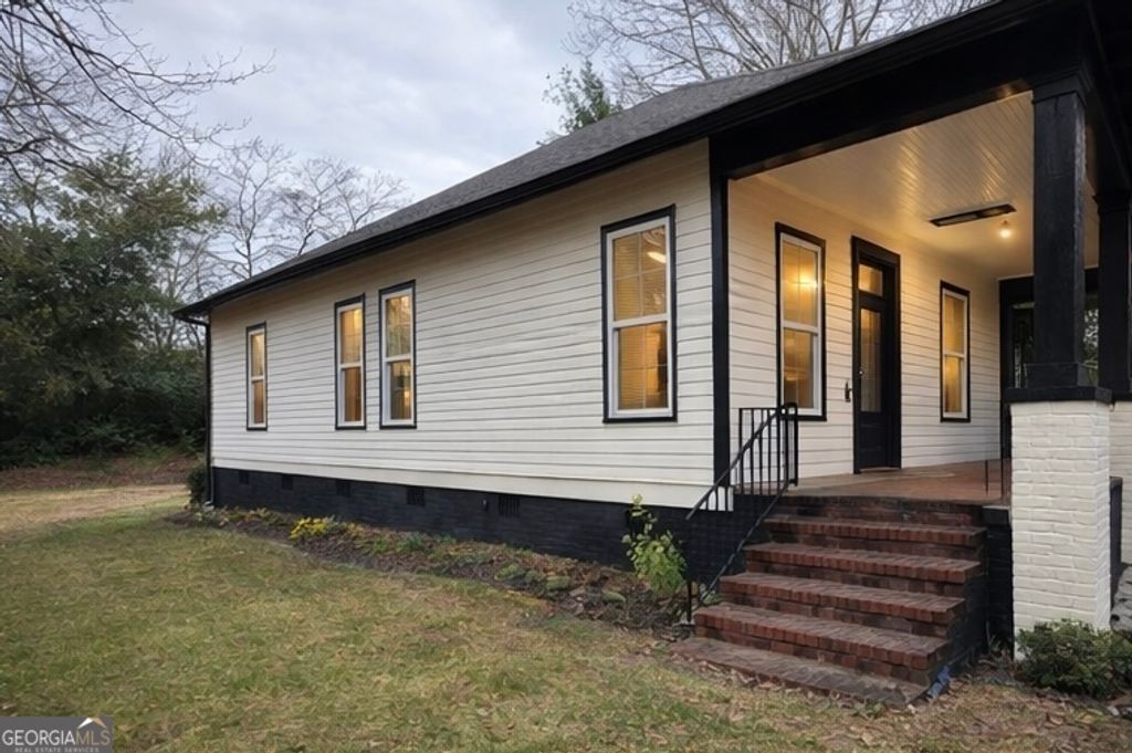 Photo of 961 Log Cabin Way, Macon, GA 31204 (MLS # 10736459)