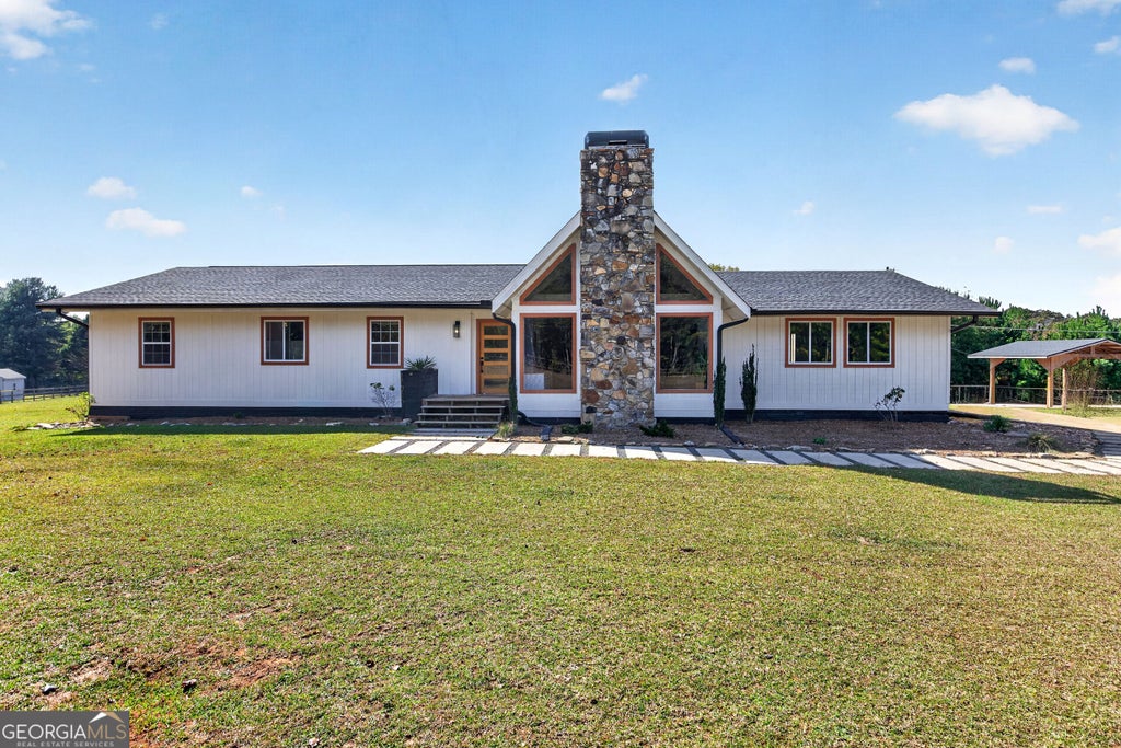 Photo of 13784 Ricketts Road, Hampton, GA 30228 (MLS # 10882224)