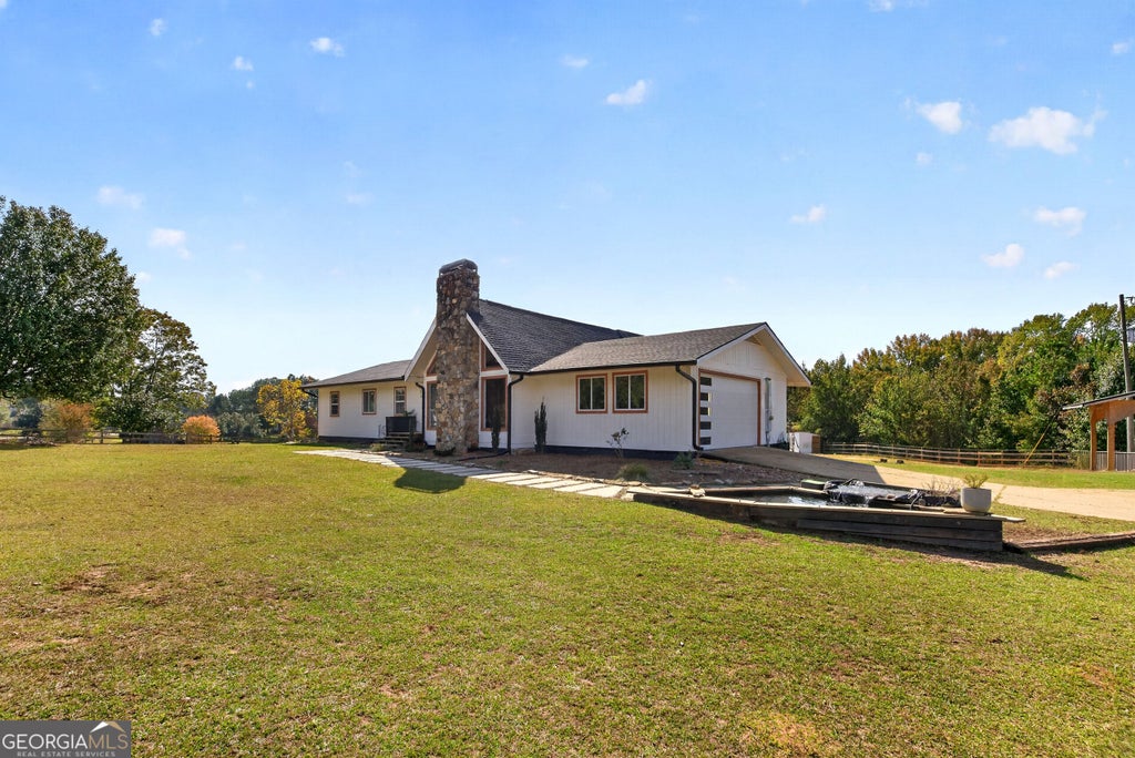Photo of 13784 Ricketts Road, Hampton, GA 30228 (MLS # 10882224)