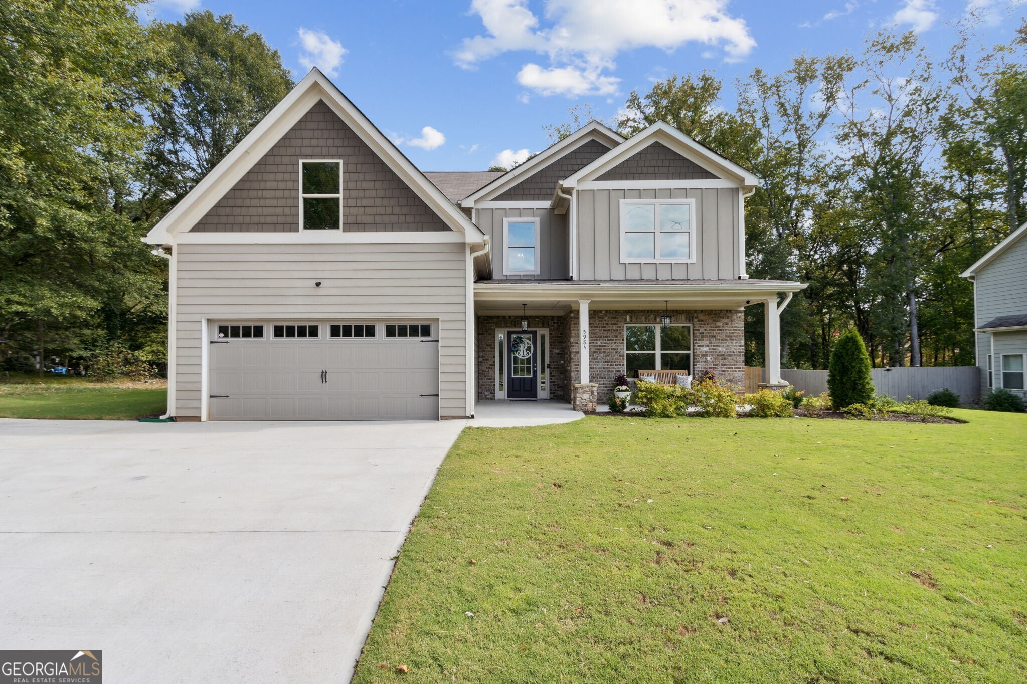 This stunning property is ideally located just 1 mile from downtown Flowery Branch, offering the perfect blend of convenience and charm. With 4 spacious bedrooms and 3.5 baths, it's the ideal space for your family!  Step inside to find a bright, open floor plan that seamlessly connects the family room complete with a cozy gas log fireplace to the eat-in breakfast area and a beautifully appointed kitchen featuring granite countertops and stainless steel appliances. The main level boasts elegant hardwood floors throughout.  Need extra space? Enjoy the HUGE media room on the second floor, perfect for kids and family movie nights. The master suite offers an oversized shower with a frameless door, adding a touch of luxury.  But that's not all! This home also features a fantastic backyard with a pool, a screened-in porch, and an outdoor kitchen perfect for entertaining. Plus, there's NO HOA!  Don't miss out on this incredible opportunity! Call today to schedule a tour!
