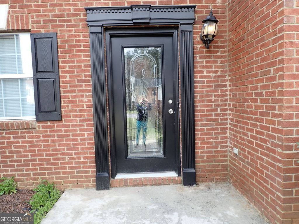 Photo of 827 Sinclair Way, Jonesboro, GA 30238 (MLS # 10687268)