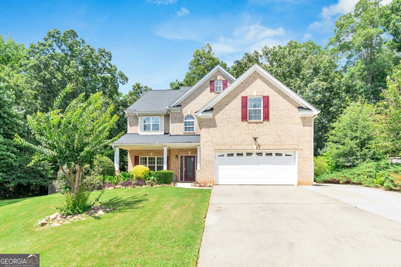 Welcome to your dream home at 305 Matthew Circle! This four-sided brick home features a two-story foyer and family room, guest suite on the main, gourmet kitchen with granite island, and a cozy sunroom. The owner's suite offers a spa-like bath and custom walk-in closet. Enjoy a private fenced yard in a quiet cul-de-sac, plus a newer roof, 1-year home warranty, Ring security system, sprinkler system, and storage unit. Close to Sprouts, Starbucks, Costco, Chick-fil-A & more! $10,000 seller paid closing cost available with full price offer.