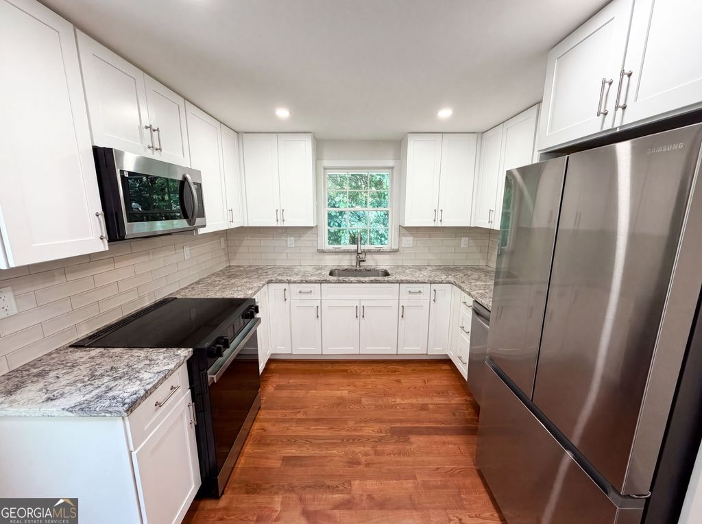 Photo of 2320 Capehart Circle NE, Atlanta, GA 30345 (MLS # 10789930)