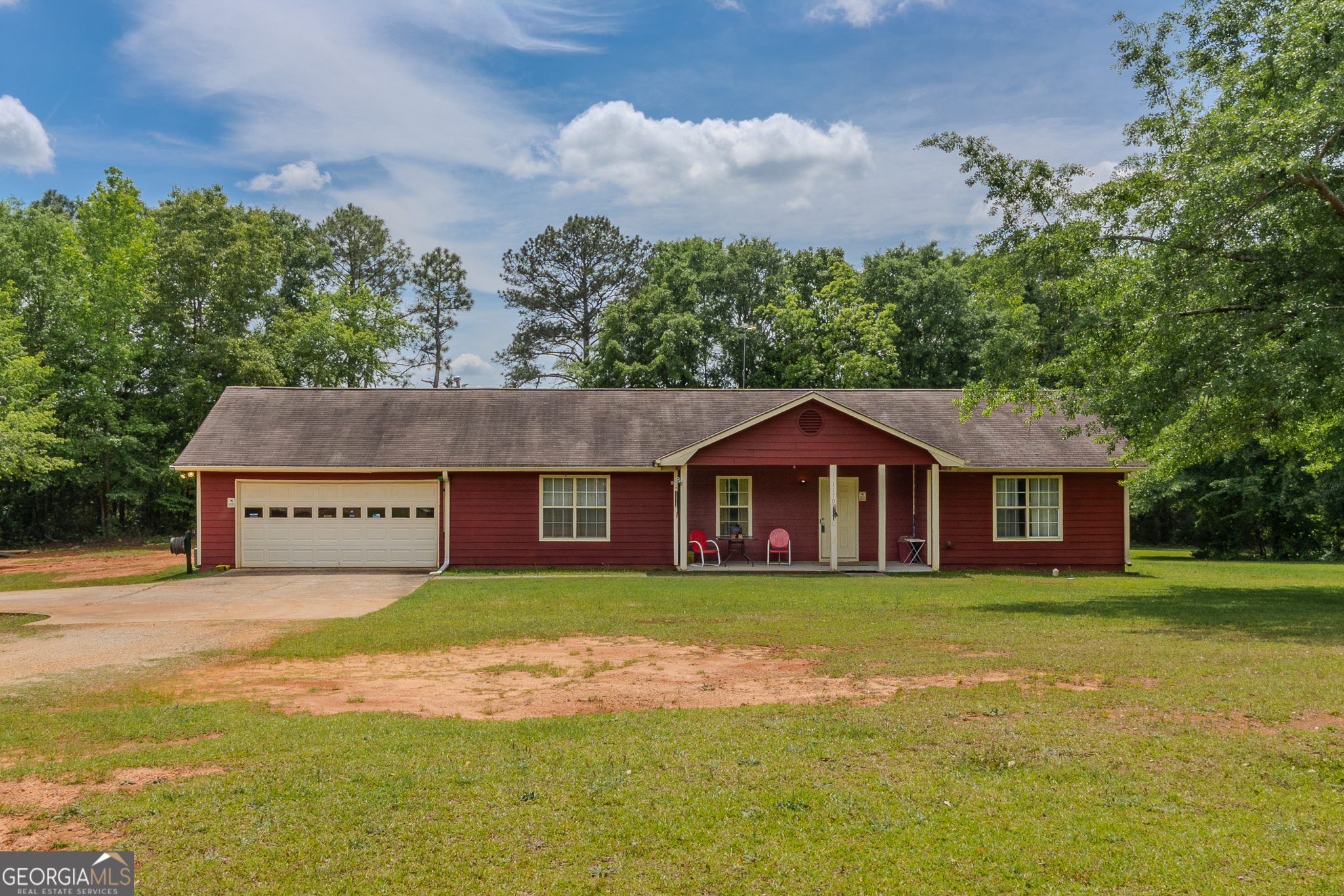 Welcome to 1170 Peeksville Road - Locust Grove, GA 30248 Nestled on 2 private acres in the heart of charming Locust Grove, this beautifully maintained 2-bedroom, 2-bath ranch offers 1,382 sq ft of inviting living space, all on one level. Built in 1997, this home features an open-concept layout, updated HVAC, roof, and hot water heater-providing comfort and peace of mind from the start. Step outside and discover a backyard surprise-a true man cave's dream! This impressive two-story workshop offers ample space for storage, workshop projects, hobbies, or creating the ultimate hangout zone. Whether you're a car enthusiast, craftsman, or collector, this space is ready to be transformed to suit your lifestyle. Additional features include: 2-car attached garage Spacious front and back yards Quiet, peaceful setting perfect for nature lovers or those seeking room to roam No HOA Why You'll Love Locust Grove: This home is just minutes from I-75, making commutes to Atlanta a breeze. Enjoy small-town living with big-time perks-like Tanger Outlets for shopping, Southern Belle Farm for year-round family fun, and Noah's Ark Animal Sanctuary for a unique local treasure. Parks, great schools, and community events make Locust Grove a place people are proud to call home.
