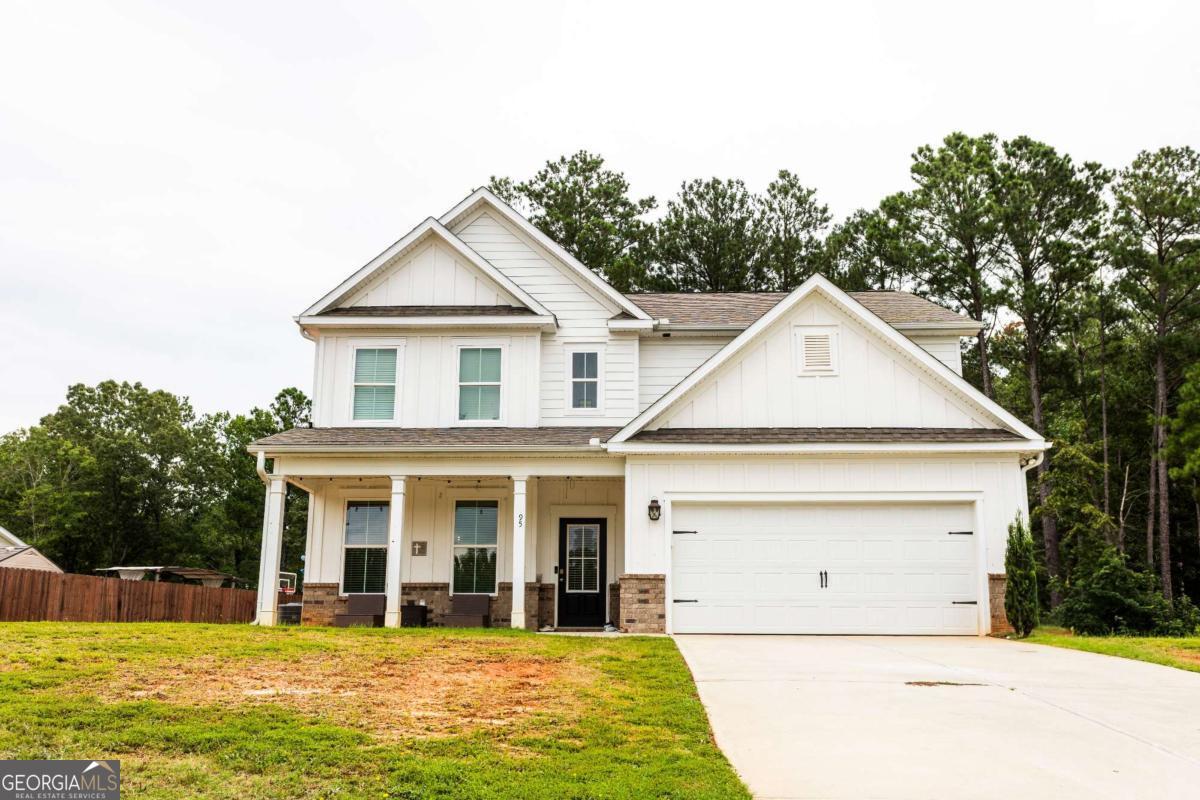 This thoughtfully designed 4-bedroom, 3-bathroom home offers a spacious, flexible layout perfect for modern living. Enjoy the convenience of a main-floor bedroom for guests or multigenerational needs, while the open kitchen flows seamlessly into the living room for easy entertaining and everyday connection. A dedicated dining room adds charm for cozy dinners or festive gatherings. Upstairs, a large loft offers bonus living space-ideal as a second living room, playroom, or home office. The upstairs laundry room keeps chores close to where they're needed most-no hauling baskets up and down the stairs. And the primary suite brings comfort and style, featuring two walk-in closets and a generous walk-in shower. Just off the 2-car garage, you'll find a handy mud room-perfect for managing shoes, gear, and daily essentials. Nestled between two cul-de-sacs, the home boasts a unique setting that enhances its friendly neighborhood vibe. Bright, inviting, and built with intention-this 2020 home is ready to offer space, style, and versatility to its next owner