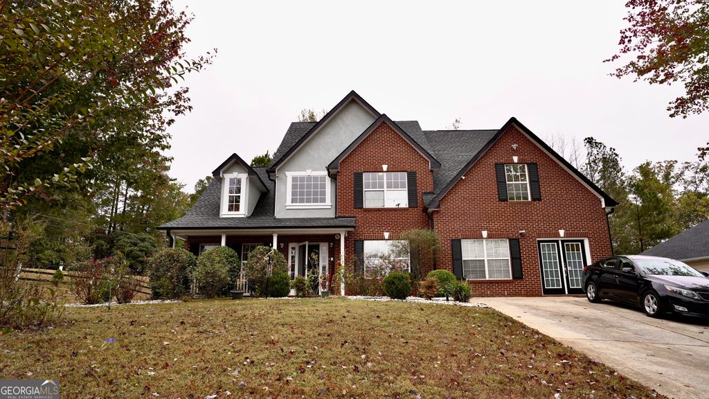 Photo of 5004 Owen Mill Trail, Stone Mountain, GA 30083 (MLS # 10654092)