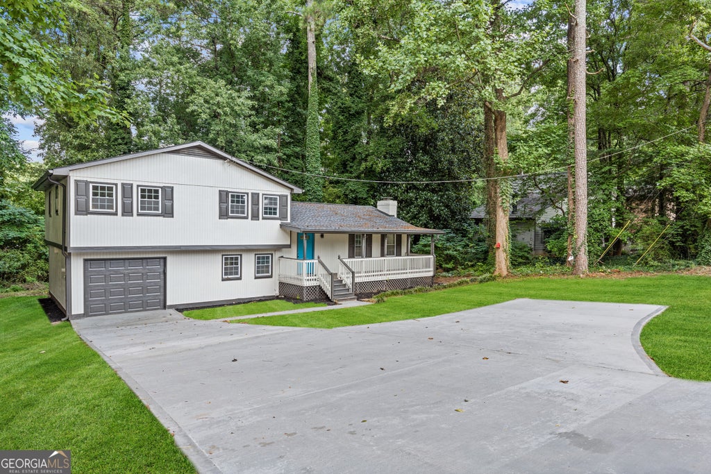 Photo of 353 Old Rosser Road, Stone Mountain, GA 30087 (MLS # 10836039)
