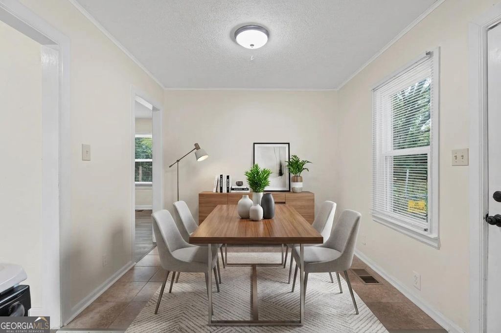 Photo of 802 Bridge Avenue, Forest Park, GA 30297 (MLS # 10812921)
