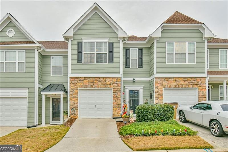 This Tide Water Cove townhome may be just what you are looking for! You'll be walking distance away from lake access, Hideaway Bay Marina, Fish Tales Restaurant, park, playground, and more! Just minutes away from downtown Flowery Branch, I-985, and more dining and shopping. This home features three bedrooms, 2.5 baths, engineered hardwood flooring downstairs, with carpet upstairs, all of which is very clean and well maintained. The larger master suite features a vaulted ceiling and unique master bath plan, with separate shower and soaking tub. The kitchen features beautiful, stained cabinets, gas oven/cooktop and has a more separated feel with the pass-through opening to the living room. Washer/Dryer/Refrigerator included Within minutes of I985 , Close to everything