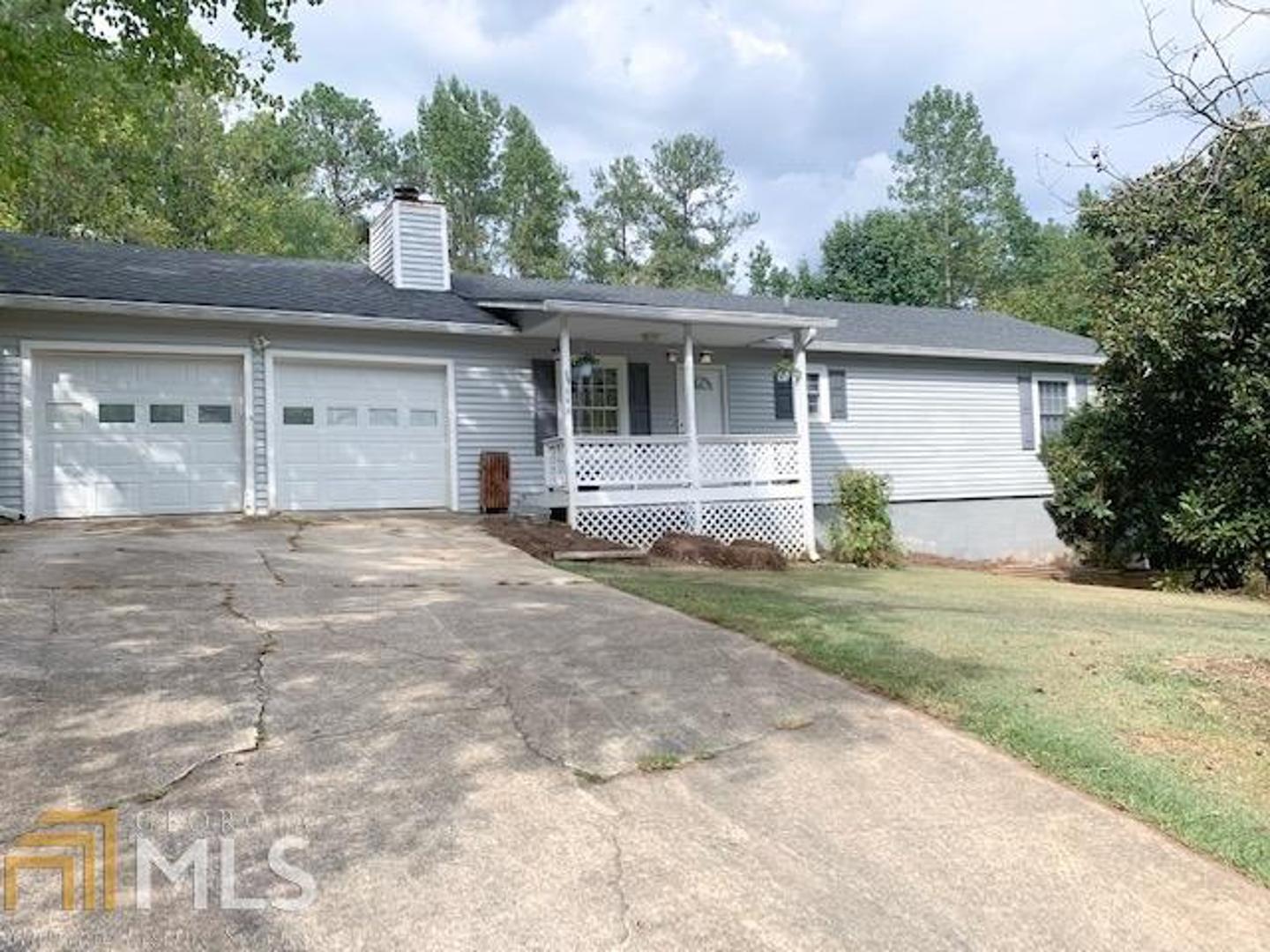 Lovely Ranch home on large lot with fenced in back yard. This home has 3 bedrooms, 2 full bathrooms and an open kitchen, dining, and living room concept. Freshly painted and freshly cleaned carpets. Has a full unfinished basement with so much room for potential, rock fireplace, Separate laundry room and 2 stall garage. Welcome Home.