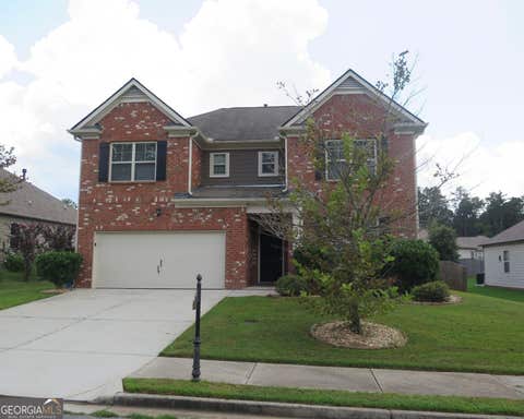 Photo of 536 Wolf Pack Lane, Atlanta, GA 30349 (MLS # 10824384)