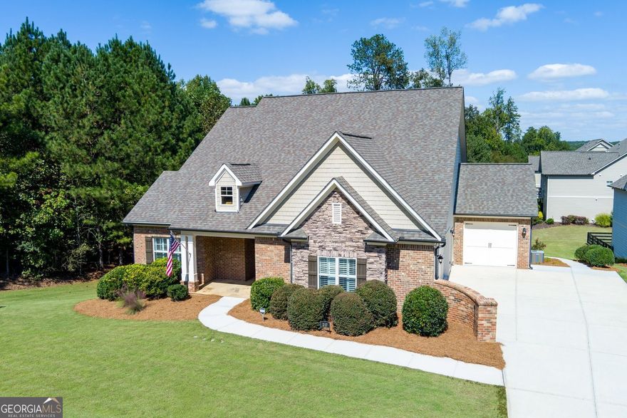 If you know Woodstock, you know Sweetbriar Farms is a special community. Hard to find 55 and over gated neighborhood close to great shopping, restaurants and parks- yet feels secluded and quiet. Homes in this community don't often hit the market, so move quickly. This is one of the premier floorplans in Sweetbriar Farms. Two bedrooms on the main level (including the Master bedroom), additional office/ media room on the main level, two bedrooms upstairs each with full bath. Terrace level includes large bedroom, full bathroom and a private kitchen, media room and extra unfinished storage space. This ADA compliant home includes wide doorways, walkways and closets offering amazing accessibility. The three car garage is convenient for golf carts, extra vehicles or additional storage space. And zero steps from the garage to the kitchen. This is the house you have been looking for. You will love the comfortable living area open to the kitchen. Walk-in custom pantry is great for organization. The great spaces go on and on. Outside the house- Landscaping and lawn maintenance are included with the HOA.