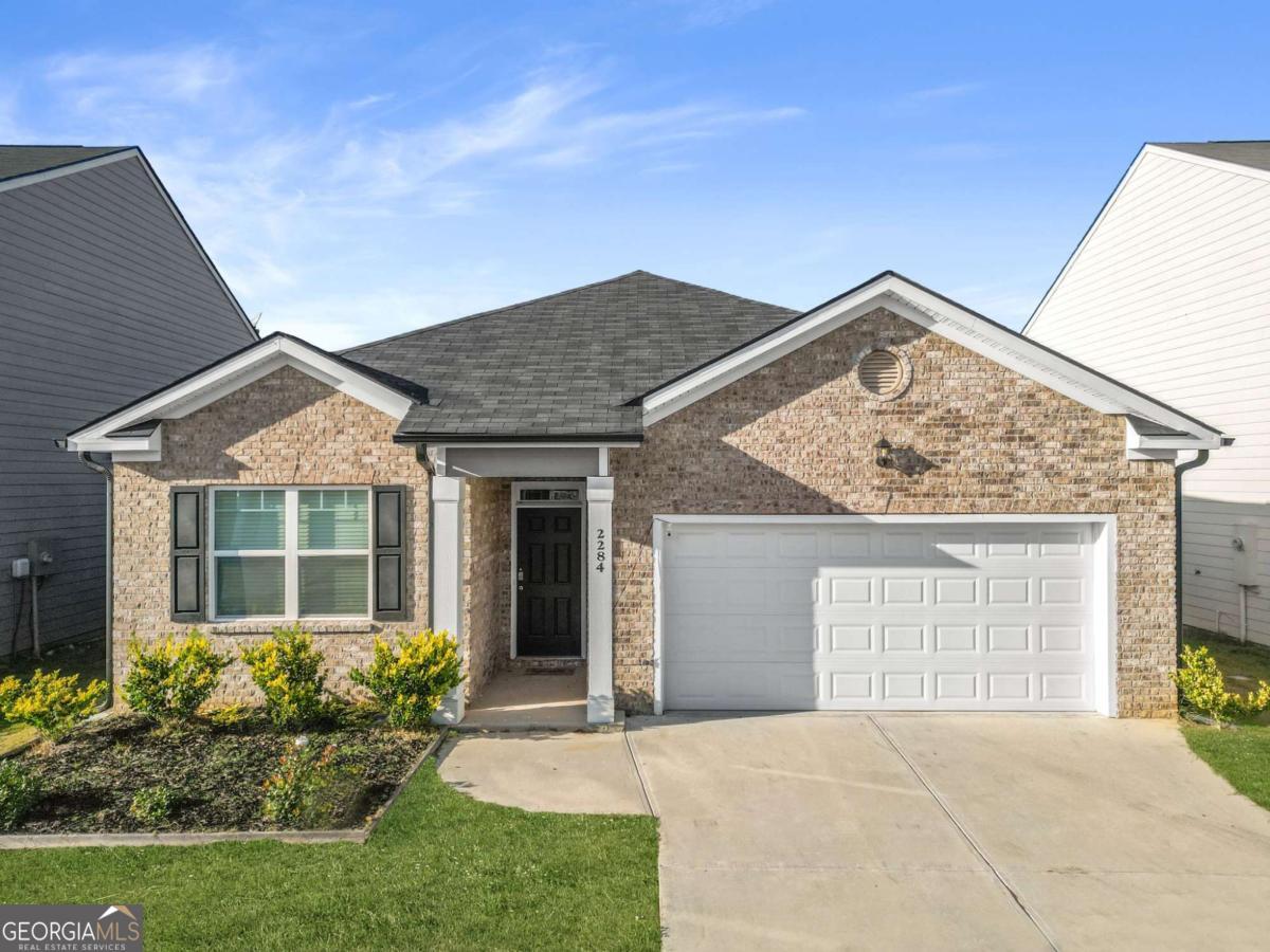 WOW WOW WOW such a beautiful ranch built in 2022 with 3 bedrooms and 2 baths in SUMMERWIND subdivision which is just minutes off of highway 316. This home situates on a level front yard and relatively level backyard in a swim and tennis subdivision. The driveway is longer where you can park up to four cars and two cars in the attached garage. The home offers the open floor concepts with lots of natural light. The kitchen offers the big island with granite countertop. The kitchen with the chef inspired concepts that flow into the family room and a casual dining area where your family can enjoy. Escape to a private bedroom suite with spa-like bath, spacious secondary bedrooms invite natural lights and offers plenty of extra storage. The home offers two car garages, a front covered porch and a covered patio in the back. The backyard is relatively level and very nice and spacious with beautiful grass. This fantastic home is in Gwinnett county with beautiful parks, shopping, dinning and entertainment. Such an excellent ranch home in a quiet neighbourhood and excellent school districts. Community amenities include a swimming pool, pickleball courts, tennis facilities, a playground, and beautifully landscaped areas. Conveniently located near shopping, Highway 316, and I-85, and short drive to Athens and UGA; this home seamlessly blends comfort with convenience. Hurry before it is gone !!!