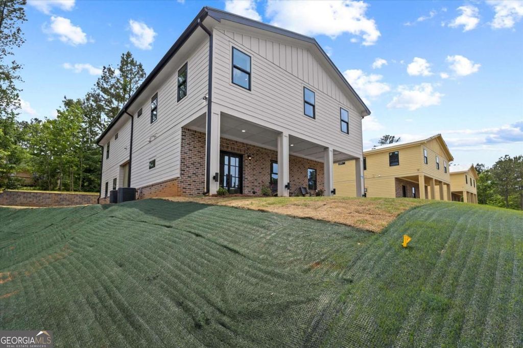Photo of 6848 Silver Maple Dr, Rex, GA 30273 (MLS # 10761464)