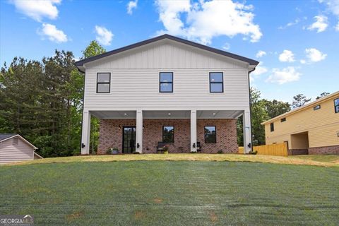 Photo of 6848 Silver Maple Dr, Rex, GA 30273 (MLS # 10761464)