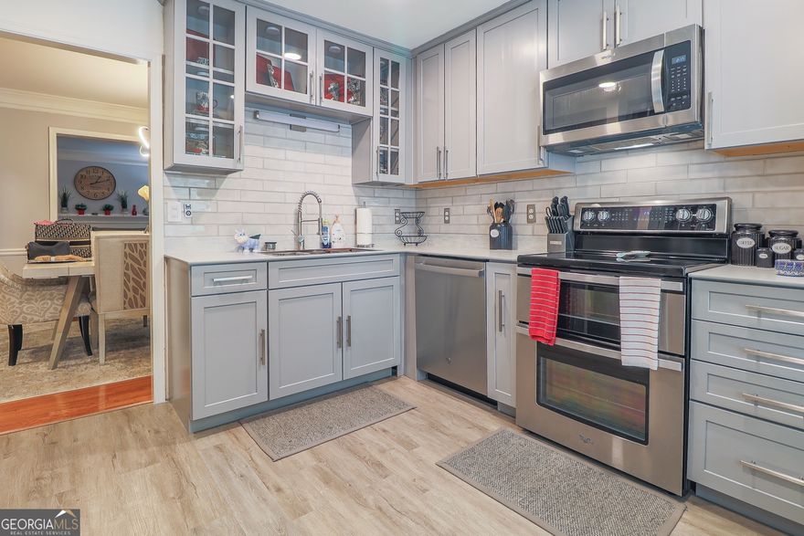 This 2-level townhome is a lovely place to call home! The combination of its prime location and well-designed features make it a very attractive choice for potential residents.  Some highlights include its proximity to numerous amenities such as restaurants, shopping, health services, and recreational parks, making daily life convenient and enjoyable. The updated gourmet kitchen with professional stainless-steel appliances is a standout feature, sure to please any home chef. The dedicated dining room provides an elegant space for hosting gatherings.  The cozy living room with a fireplace and the glass-enclosed sunroom are great places to relax and enjoy downtime. The layout and features of the bedrooms, including the spacious owner's suite, provide comfortable and functional living spaces. The lower level offers flexibility with a recreation room and full bath, accommodating various needs and preferences.  Additional perks, such as low HOA fees, a 1-car garage, and ample parking in the driveway, add to the overall appeal of this townhome. It sounds like a wonderful opportunity for those looking to make it their new home!