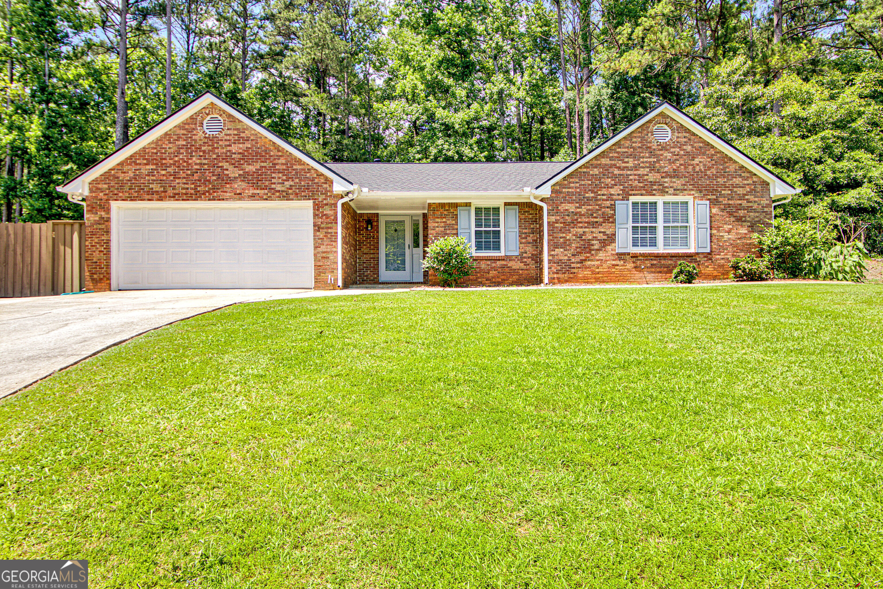 Newly updated ranch house in the heart of Peachtree City for rent. Enter into an oversize living room and dining room with all NEW LVP flooring located just off the granite counter top kitchen with white cabinets. The oversized bonus room is a great escape and perfect gathering spot your family is sure to enjoy. The large master bedroom perfectly outfitted with a gorgeous tiled shower. Two large bedrooms share an updated bathroom. Fully fenced yard and extra storage shed for all your equipment! Centrally located to schools, shops, and restaurants!