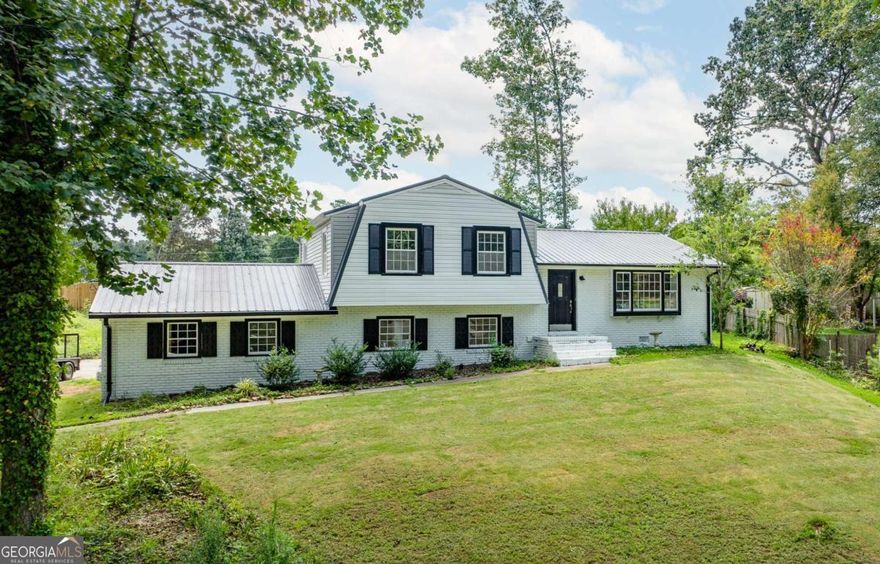 Back on Market!! No fault to seller! Stunningly renovated 4-sided brick split-level in the sought-after Piedmont Hills community. This spacious 5 bedroom offers an open-concept layout with expansive windows that fill the home with natural light. The modern kitchen boasts quartz countertops, subway tile backsplash, floating shelves, stainless vent hood, and all NEW appliances now included (photos were taken before installation, come see them for yourself!). A bright sunroom overlooks your private backyard retreat, complete with koi pond and a swimming pool with renovations currently underway. The lower level features a bedroom, full bath, large den, laundry, and exterior access, perfect for a guest suite, home office, or multi-generational living. Recent updates include fresh interior and exterior paint, new flooring throughout, stylish bathrooms, and a durable metal roof. Conveniently located near I-575, shopping, dining, and excellent schools. This home has been completely transformed inside and out, from the upgraded kitchen and renovated baths to the refreshed outdoor living space. The seller is motivated and ready to make a deal. Schedule your private showing today before this one is gone again!