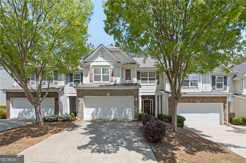 WELCOME HOME!! This lovely townhome has it all! A private front porch greets you into this immaculately maintained home that is move in ready with updated features of granite and hardwood floors on the main level. The open floorplan and wall of windows make for a bright and generous area to entertain. The eat in kitchen has a breakfast bar as well, with ALL APPLIANCES REMAINING with the home. So much storage including a pantry. Easy access to the private patio is also a nice retreat with plenty of room to grill and enjoy the outdoors. The family room is made cozy with a gas fireplace and marble surround. The area divides into a large formal dining space to host many friends and family. The updated stairway takes you upstairs to 3 large bedrooms and a loft area great as a second living area, office or playroom. The large main bedroom has a trey ceiling and neutral palette with a large ensuite including a soaking tub and shower. Secondary bedrooms share a lovely bath with 2 large linen closets. The laundry is located upstairs right off the main bedroom. Two car garage with room to store items. Mountain Brook is a charming community with swimming pool, walking trails, fishing dock/pond and dog walk. Great schools and the location is conveniently located between Downtown Woodstock and Roswell. Shopping and dining are nearby and easy access to 575 and 75 as well as hospitals and healthcare. DON'T MISS THIS ONE!