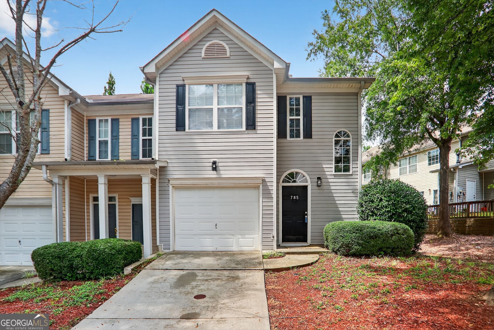 Welcome to your move-in ready townhouse located in the vibrant heart of Atlanta. This end-unit home offers the perfect blend of modern convenience and urban accessibility. Step inside to a neutral color palette that creates a serene and inviting atmosphere. The main level is designed for effortless living and entertaining. Upstairs, you'll find two oversized primary suites, each featuring a private full bathroom and a large walk-in closet, providing ample storage and a private retreat for all. This home's location is truly exceptional. Enjoy the security of a gated community while being just a short walk away from a variety of parks, top-rated restaurants, and local shops. Don't miss this opportunity to own a piece of the walkable Atlanta lifestyle!