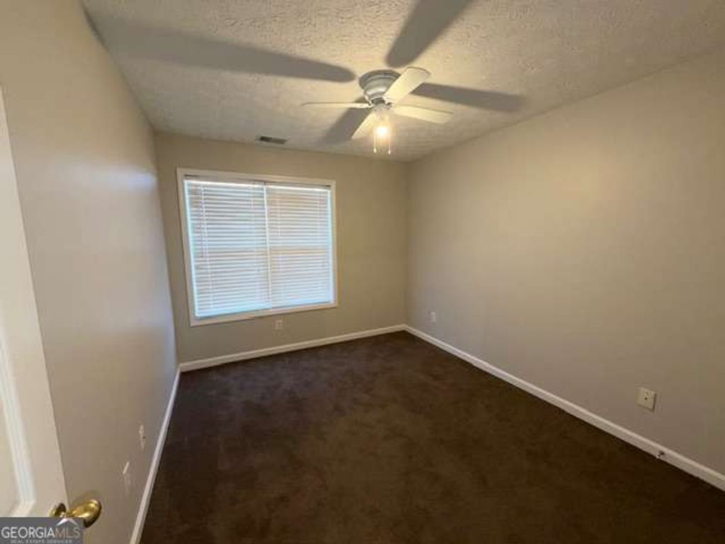 Photo of 283 Ridgestone Way SW, Marietta, GA 30008 (MLS # 10757740)