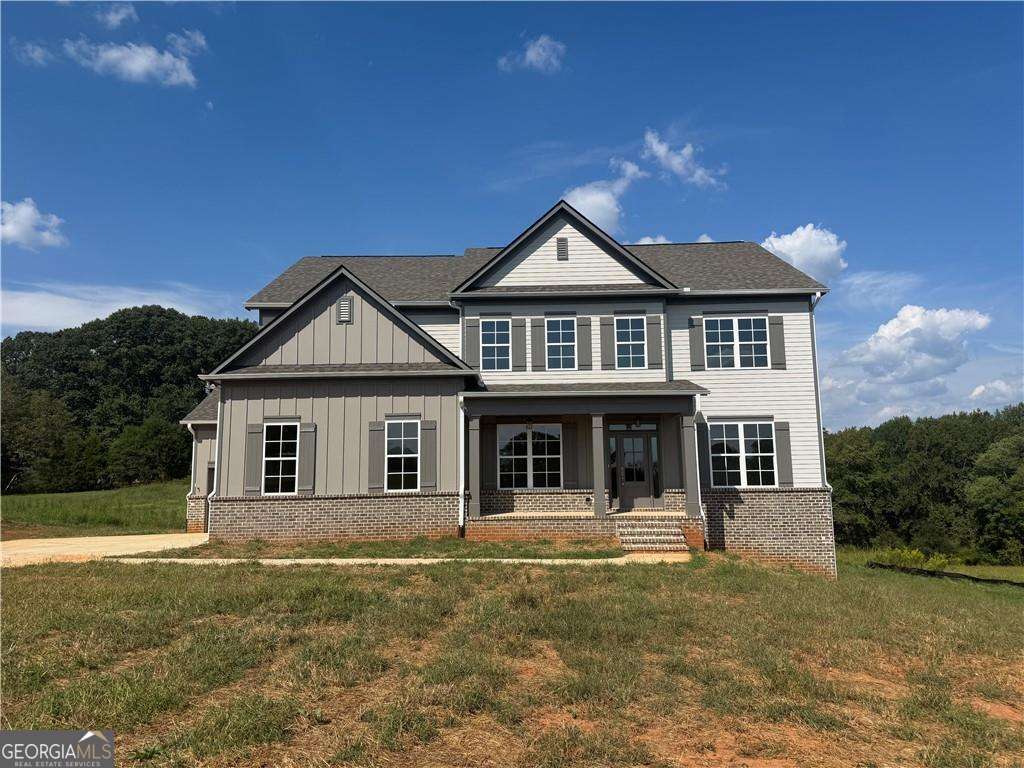 Offering $10,000 in incentives. 1 of 5 Homes (2 sold 3 remaining). Beautiful New Construction. Farmhouse Style, Covered Front Porches, Large Private Lots, No HOA, Three Car Garages. Standard Features Include ten Foot Ceilings on Main and nine foot Upper Level, CAT 5 for Telephone, RG6 for Cable Connectivity in Family Room and master Bedrooms. Modern Farmhouse Trim Package, Dining Room with custom trim, Engineered Wood flooring in Foyer, Kitchen, Breakfast, and living room. Satin Hardware and Light Fixtures. Large Master Bedroom Features with Tub; Separate Shower with Clear Glass Door, Double Vanities, Walk in Closet and Floor and Wall Tile, Kitchen Features Quartz Counter Tops, Tile Backsplash, Recessed Lights, Pantry wood shelving and Whirlpool stainless steal Appliances to Include; 36 Inch Cooktop, Dishwasher, double-oven with Microwave Kit and Vent Hood. Generous Size Secondary Bedrooms. -Must schedule with the listing agent to walk home and property. Home is roughly 30-45 days from completion.