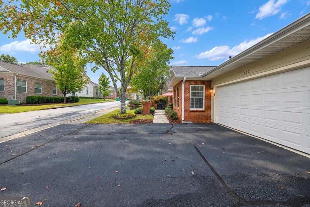 Photo of 229 Villa Park Circle, Stone Mountain, GA 30087 (MLS # 10867629)