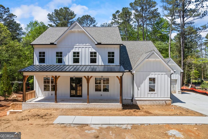**BUILDER INCENTIVES-$15,000 TOWARDS CLOSING COSTS WITH ACCEPTED OFFER**One-of-a-Kind - Private Brand New Craftsman Style Home situated on 1 Acre lot with No mandatory HOA, located in Beautiful Alpharetta. You get the feel of living in the "Country" yet perfectly located 11 minutes from Avalon for premier shopping and dining, 4 minutes from the middle school perfect for families, and Just minutes from Highway 400, making commutes a breeze. This Showstopper has 4 Bedrooms/3.5 Bath Home, and is Loaded with Upgrades including a 3-car side Entry Garage, Large Front Porch,   10-foot Ceilings, 8-foot doors, Crown Molding, Hardwoods throughout the Main, Carpet in the Guest Bedrooms, Massive Kitchen overlooking the Keeping Room, with Quartz Countertops, Kitchen Island, SS Appliances, Walk-in Pantry, 2 Stack Stone or Brick Fireplace -1 in the Living Room and 1 in the Keeping Room, Wood Mantels, Separate Dining Room, Mud Room and a Large Laundry Room. The Master on Main features Trey Ceilings, a Huge Walk-In Closet with a Spacious Master Bath featuring a Soaking Tub, a Frameless Glass Walk-In Tile Shower with bench, His & Her Vanities! Upstairs you'll find 3 spacious guest bedrooms and 2 bathrooms. Hurry up and you can still customize your own colors. We ONLY have this lot available to choose from. You will not find New Construction that's comparable to this with Privacy and Location. Call Today to schedule a showing!
