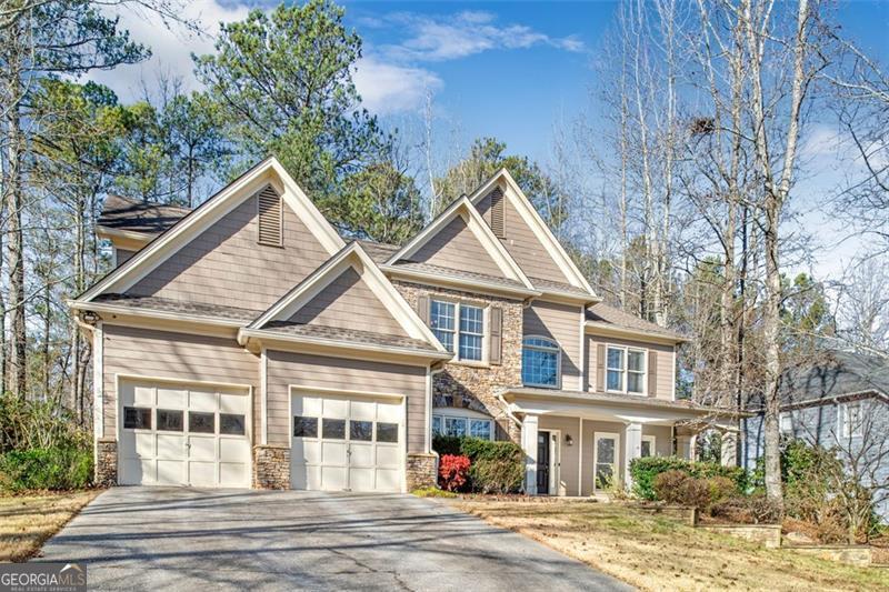 Looking for the best backyard in Johns Creek? You have found it! Sitting on almost an 1/2 acre of land, the backyard is a beautifully wooded private oasis and escape. Enjoy your morning coffee in the amazing screened porch. The Community features a swimming pool, tennis court and playground. It has modern updates such as heated master bath floors, hardwood floors and open kitchen that leads to the large family room! The upstairs AC unit is only 4 years old. The house is located in a top ranked Fulton County school district! Convenient to interstates, hospitals, shopping, dinning! This home is not to be missed!