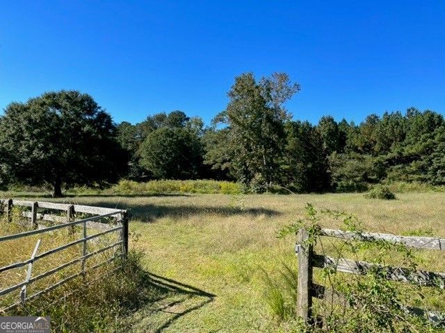 A 39.089-acre property off Hopewell Road in picturesque central Milton is for sale - open to all qualified bidders for a limited time. This expansive property along Hopewell sits south of Bethany Bend, with one side bordering Providence Park.   Milton City Council will accept sealed bids until 10:00 a.m., June 12, 2025, for the following real property located within the city limits of the City of Milton, Georgia. Conditions of Sale: The winning bidder shall be obligated to tender $50,000 in earnest money within five (5) business days of notification of bid award, to be credited toward the purchase price at closing, together with a properly completed IRS W-9 tax form. Said earnest money shall be made payable to Milton City Council in cashier's check or money order. If for any reason, other than the City's inability to convey marketable title, the closing is not consummated, the City shall retain the earnest money. No Bids under $5.159 million dollars will be considered. It is the bidder's responsibility to review the City Website for all potential updates and Addenda. Copies of the bid specifications are also available for pick up from 9:30 a.m. until 4:30 p.m., Monday through Friday. Bids will be opened publicly at 11:00 a.m., June 12, 2025, at the City of  Milton's Attorney's office, 222 Webb Street, Cumming, Georgia. Award of the bid will be made to the highest responsible bidder at a later date. Milton City Council reserves the right to reject any or all bids. Bidders and the general public are invited to attend the bid opening