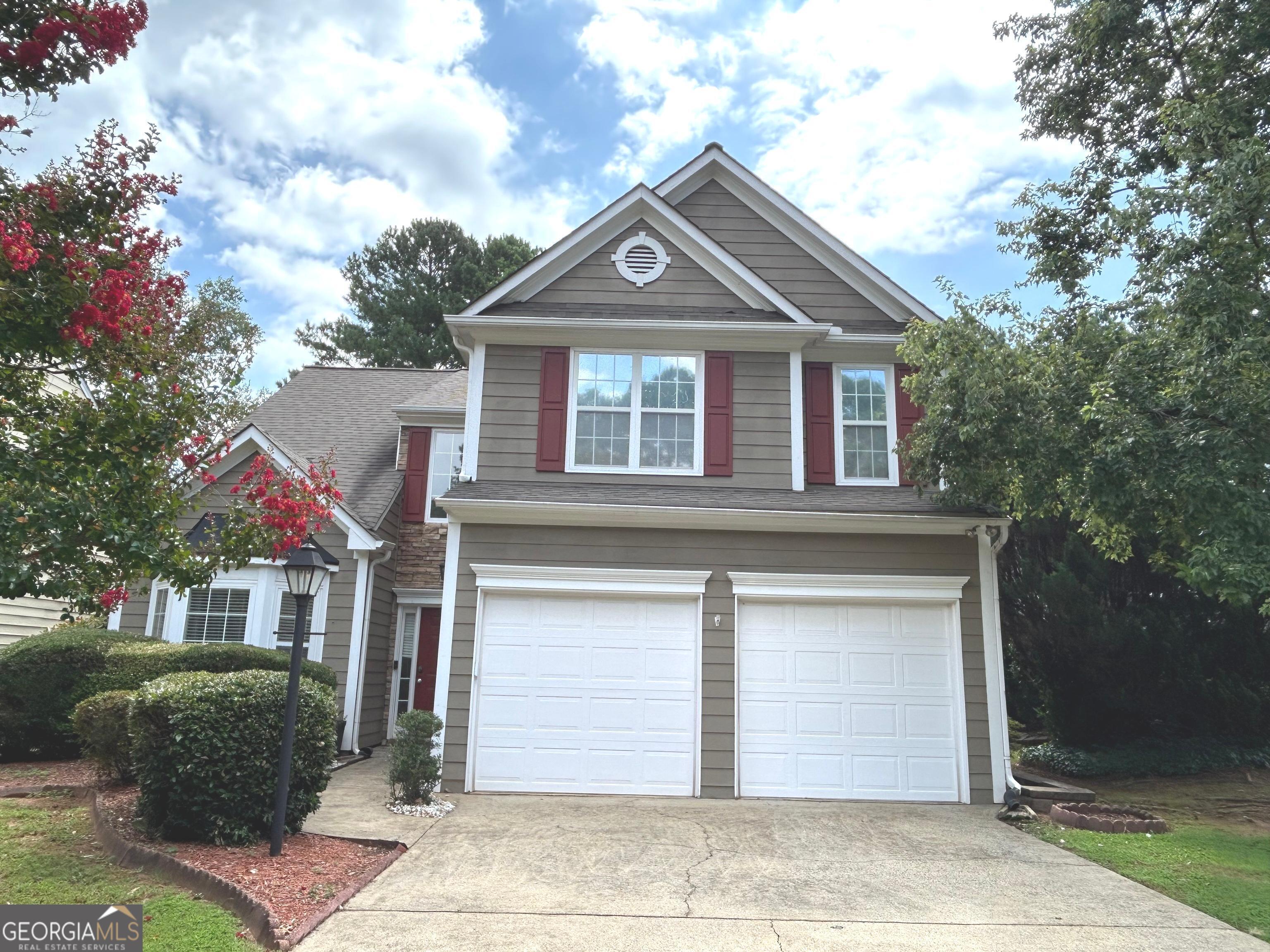Welcome to your next home-where comfort meets convenience in East Cobb. Charming East Worthington gem featuring 3 bedrooms and 2.5 baths. Home offers a spacious and thoughtfully designed layout perfect for everyday living and easy entertaining. From the stylish arched doorways to the bay window in the front living room or office, every detail adds character. The kitchen is updated with granite countertops and stainless steel appliances. The two-story family room with decorative stone fireplace offers a cozy space to kick back or host guests after a long day. Upstairs, the generous master bedroom includes a separate sitting area, a large walk-in closet, a spa tub and separate shower. Two additional bedrooms down the hall are thoughtfully set apart for added privacy. The large fenced backyard is perfect for weekend gatherings, or just soaking in the sunshine. Nestled in a swim and tennis community, you're just minutes from shopping, parks, grocery favorites, I-75, and local conveniences with easy access to nearby attractions like Truist Park. This home combines peaceful neighborhood living with proximity to everything you need-without sacrificing style or space. Call agent for showing. Credit application required.