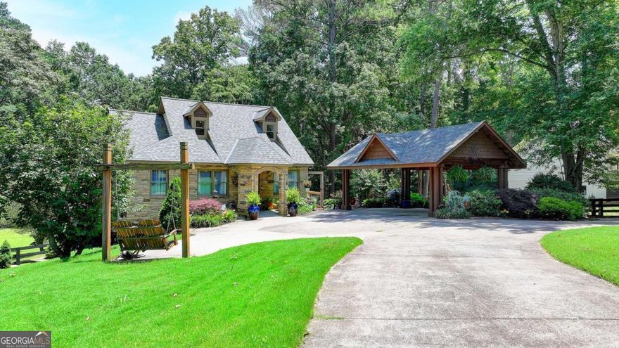 MOVE-IN READY IN MILTON! Craftsman style 5 bedroom, 3 full bathroom home on a FINISHED BASEMENT. The stone front entrance welcomes you to the open concept family room, dining room, and chef's kitchen. The stone covered kitchen island gives you plenty of room and looks over the family room. Includes stainless steel appliances, plenty of storage cabinets, and a walk-in pantry. The spacious MASTER ON THE MAIN suite has a wall of windows overlooking the private, wooded backyard. The spa-like master bathroom has been completely updated with beautifully tiled floors, double vanities, soaking tub, separate shower, and walk-in closet. The huge loft/bedroom upstairs makes for a great studio. office, or private retreat with its own full bathroom. Finished basement with large media/entertainment room and plenty of storage. The sweeping 3 year-old deck provides plenty of room for entertaining with views of the lush, flat backyard with extensive landscaping. Updates include a new roof in 2023, HVAC replacement in 2021, a tankless water heater (so you always have hot water), and an encapsulated crawl space with full warranty. Located in the sought after Camridge High School cluster and nearby top-rated private schools including Kings Ridge Christian School. Located in the heart of Milton near great shopping, restaurants, Bell Memorial Park, and with easy access to GA 400.