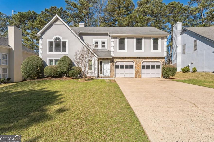 Welcome to 4180 Pineset Dr, a beautifully updated home in the heart of Alpharetta, GA.  Step inside to discover an inviting floor plan featuring spacious living areas filled with natural light.  The elegant living room flows seamlessly into a formal dining are.  The modern kitchen boasts sleek countertops, ample cabinetry, and stainless steel appliances.  The owner's suite is a true retreat, complete with a luxurious en-suite bathroom and generous closet space. Additional bedrooms are well-sized and versatile, ideal for family members, guests, or a home office.  Enjoy outdoor living on the private patio, surrounded by a lush, landscaped yard offering a serene setting for relaxation or gatherings.  This home provides easy access to top-rated schools, shopping, dining, and entertainment off of GA-400. Seller is offering $5000 incentive.